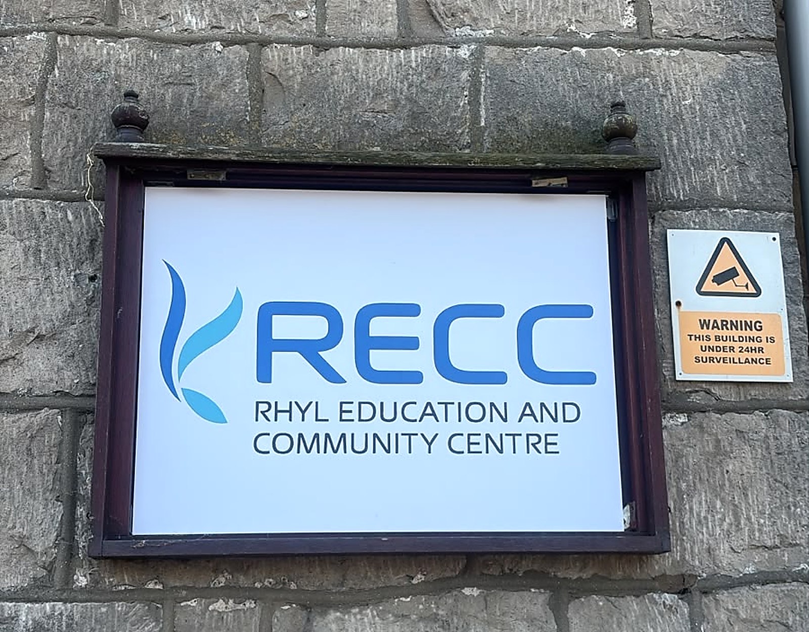 The RECC sign on the front wall of the centre